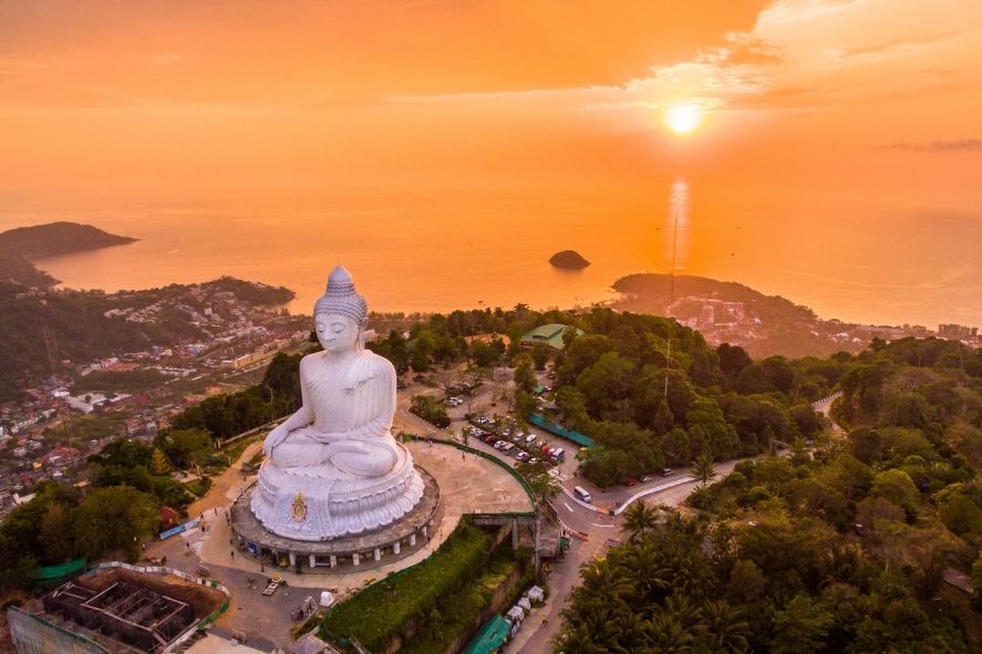sunset view of big buddha phuket on the hill